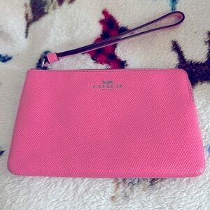 Coach Pink wristlet treated leather 3/4 zipper pink interior card slots & strap